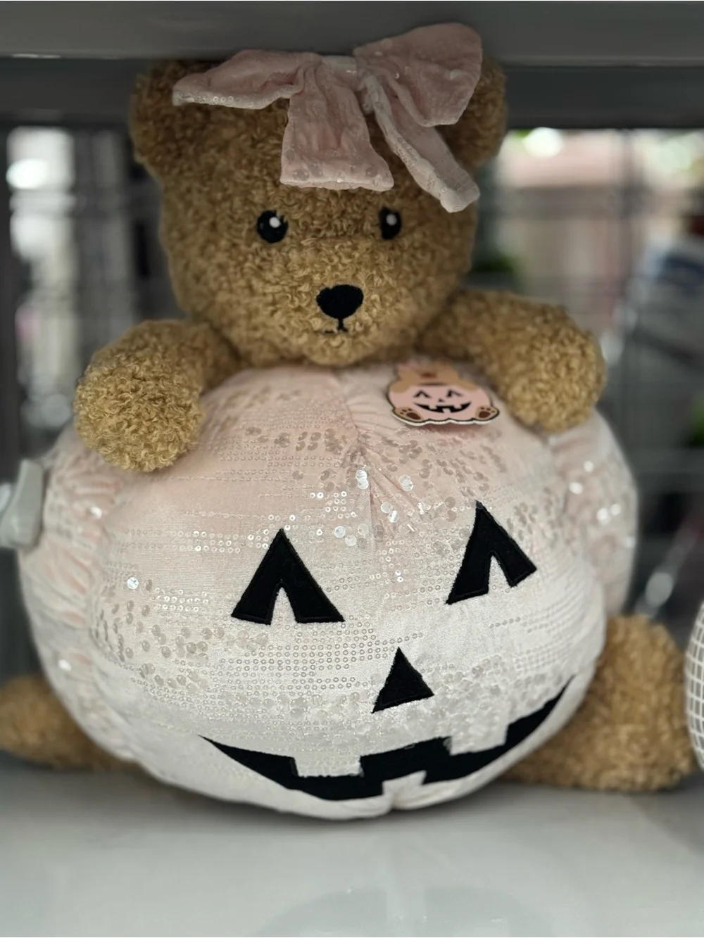 Bear Holding Pink Sequin Jack-O'-Lantern Pillow